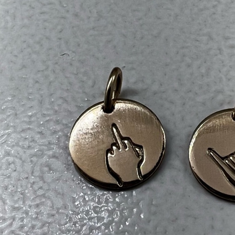 “Nope” charm